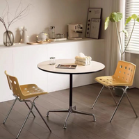 モノトーンラウンドテーブル｜ミッドセンチュリーデザインの省スペース