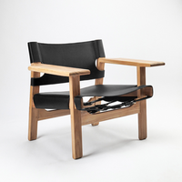 6JOHAN Sling Lounge Chair ブラックレザーと木製フレームのチェア ミニマルで重厚な印象のデザイン
